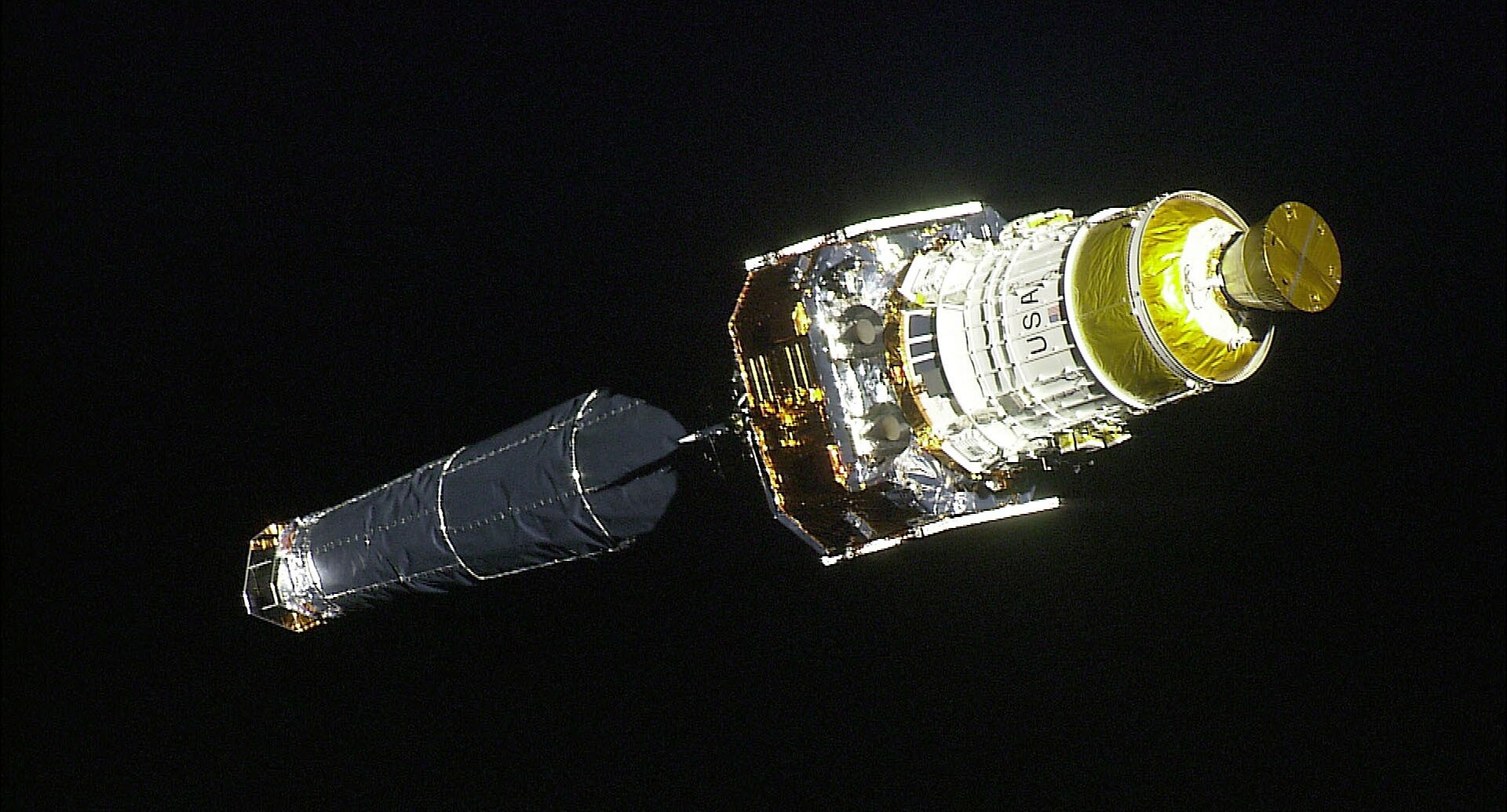 The Radio Phoenix Ignites. Related source image: Chandra X-ray Observatory after release from Space Shuttle Columbia