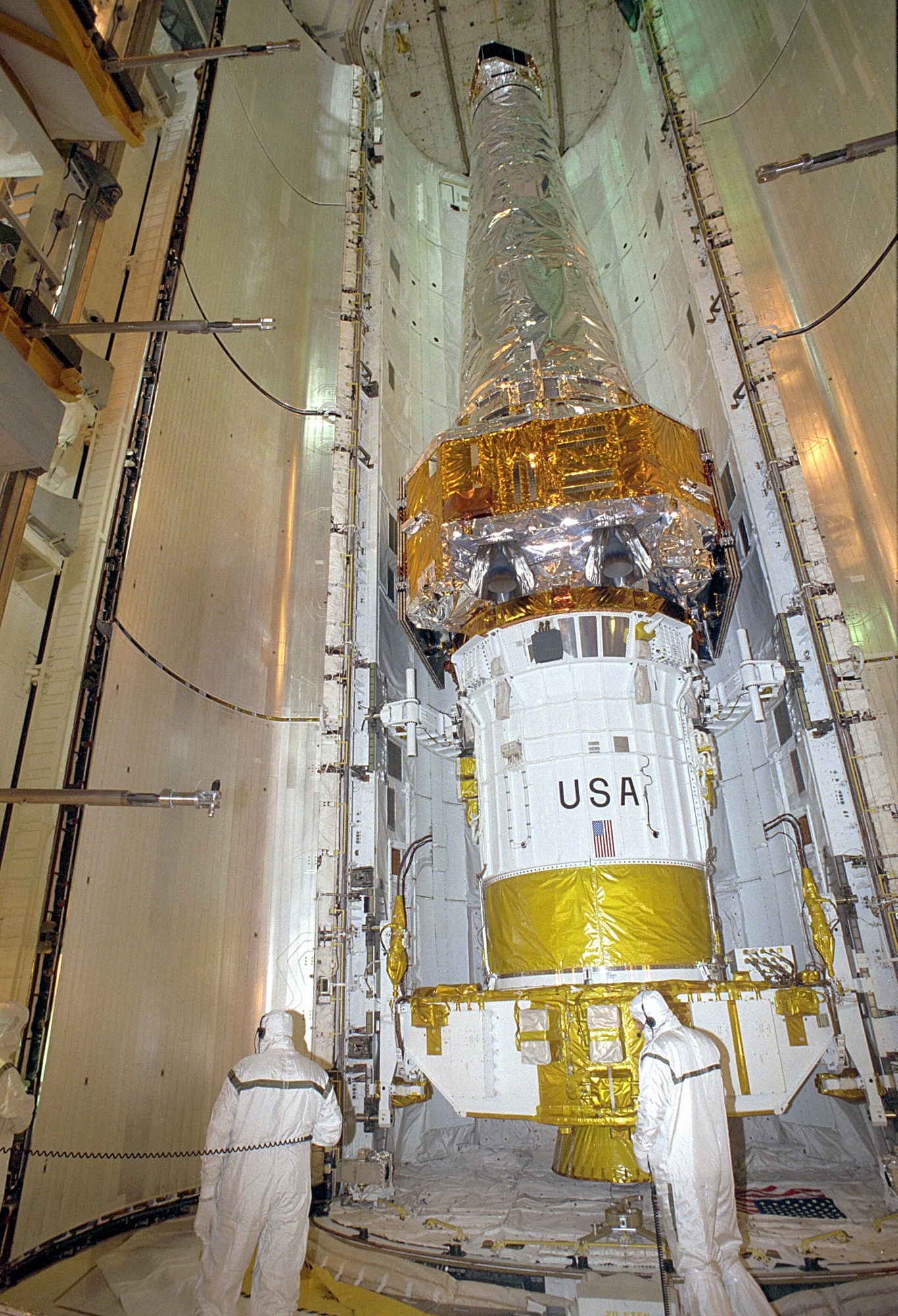 Reading the Collision Remnants. Related source image: STS-93 Payload Bay Door Closure - GPN-2000-000854